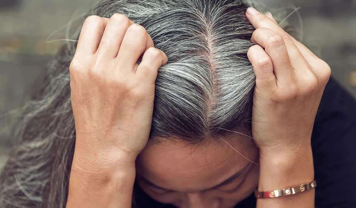 las canas pueden aparecer por enfermedades